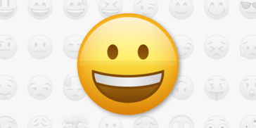 Smiling face emoji with background of many emojis with different facial expressions.