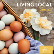 Cover of Living Local spring edition. Eggs in a basket. 