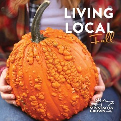 A picture of an orange pumpkin covered in adorable nubby bumps. It is the cover of the magazine, Living Local, Fall issue.