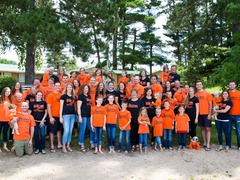 The Barten Family picture, over 50 people all in orange t-shirts.