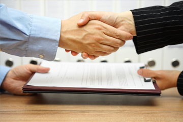 two people shaking hands