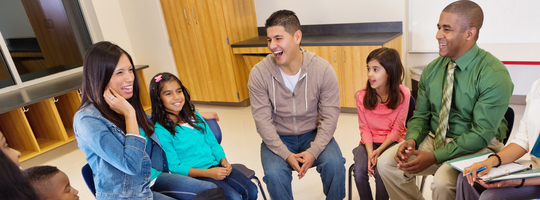 Parents, students and teachers talking