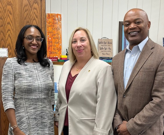 Eastern Carver County Schools Superintendent Dr. Lisa Sayles-Adams, Chaska Middle School West Principal Alicia Fischer and Commissioner Willie Jett. 