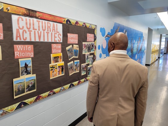 Commissioner Jett looks at a cultural activities display