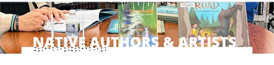 people writing at a table