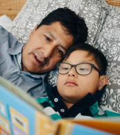 Parent reading with son
