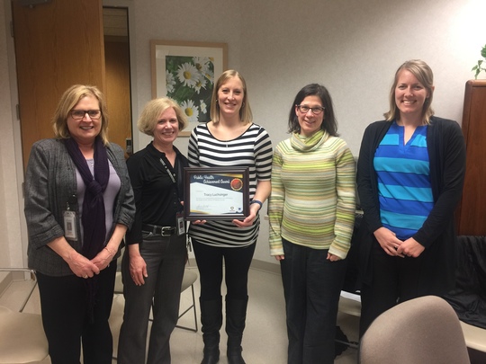 Dakota County Public Health Nurses present certificate to Tracy Luchsinger, PA-C.