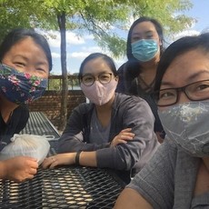 Members of the MDH Community Liaison team. From left to right, Chong Lee, Sincai Vue, Duzong Yang, and Dai Vu.