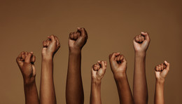 Black fists up in the air 