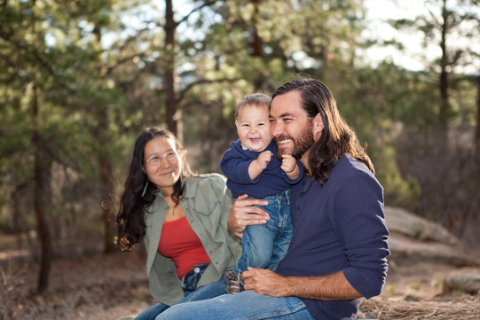 Native American family smiling and laughing together