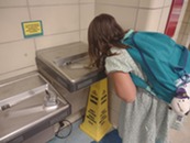 Child at drinking fountain