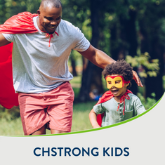 Father running with child, both wearing superhero costumes. Below them is text that says 'CHSTRONG KIDS'
