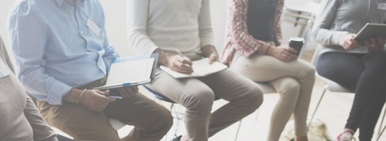 people sitting in chairs 