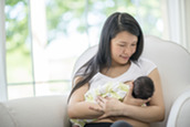 breastfeeding mom with baby