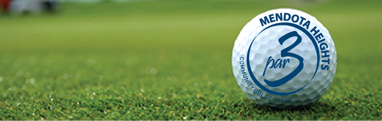 Close up of white golf ball with Par 3 circular swoosh logo on golfing green.