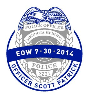 Badge design with eagle on top, text "Police Officer Mendota Heights EOW 7/30/2014, Officer Scott Patrick, Police 2231"