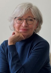Linda Ward Sitting with her chin on her hand