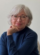 Linda Ward Sitting with her chin on her hand