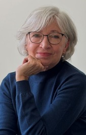 Linda Ward Sitting with her chin on her hand
