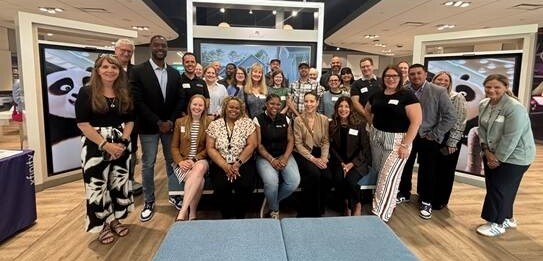 A group photo of people gathered at a networking event