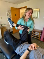 Embody Physical therapist working on client