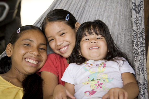 Three girls smiling