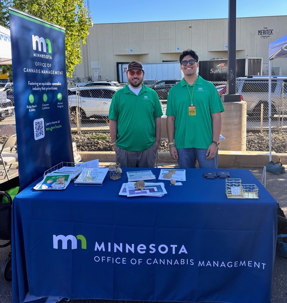 Ben and Ruben tabling at Legacy Cup with OCM merch