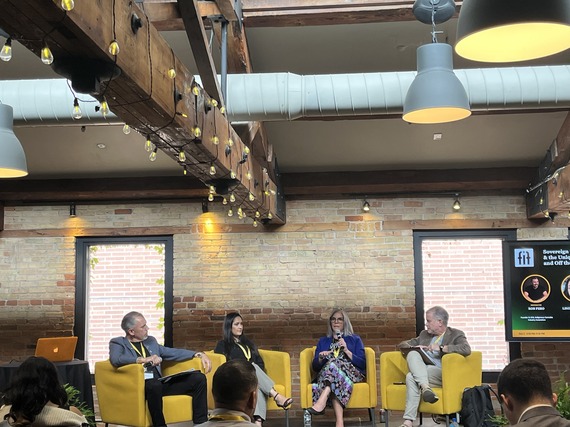 Melanie Franks and 3 others sitting in yellow chairs discussing Tribal cannabis