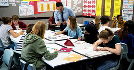 Classroom with a teacher and students.