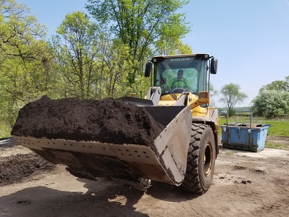 Front-End Loader With Bucket Full of Compost