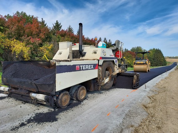 Asphalt is Laid Over the Concrete and Ash Foundation
