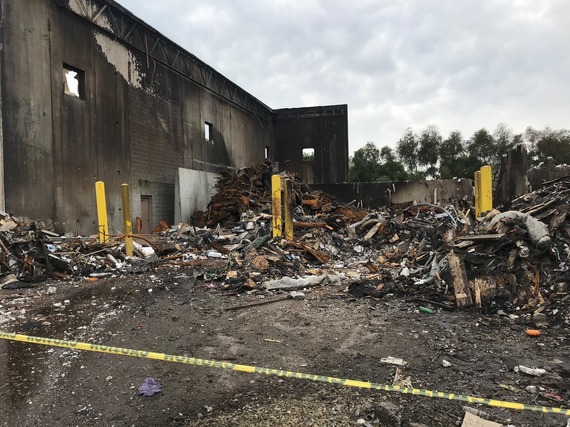 Remnants of burned building from battery fire