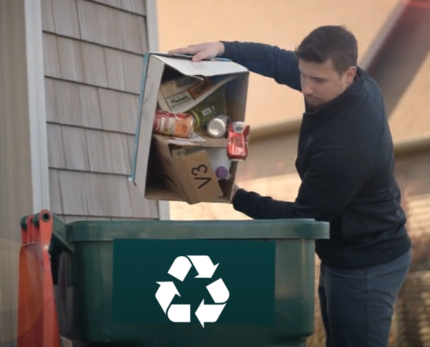 Trash Talk Presentation Cover Photo - Man Dumping Recyclables in Cart