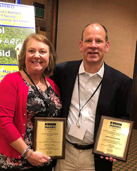 Terri Smith (left) with award