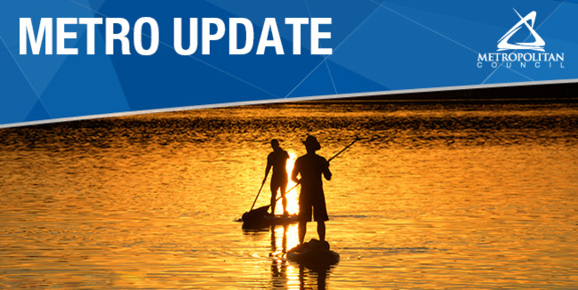 Paddleboarders at sunset.