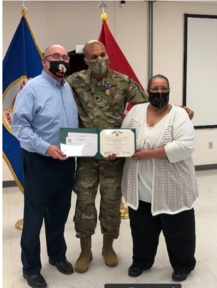 Part-time bus operator Osmane Bah receives a Purple Heart.