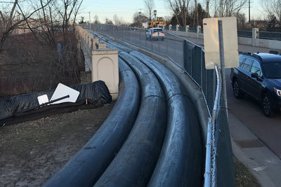 Temporary conveyance of wastewater over Minnehaha Creek. 