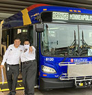 Orange Line bus and drivers