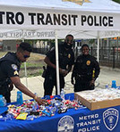 Transit police officers at community event