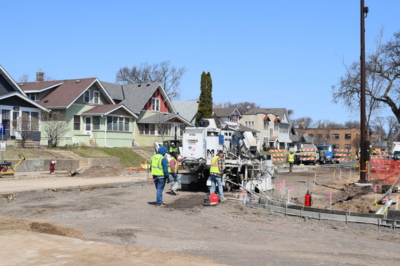 crews completing curb and gutter work at the intersection of Chicago and 42nd in South Minneapolis