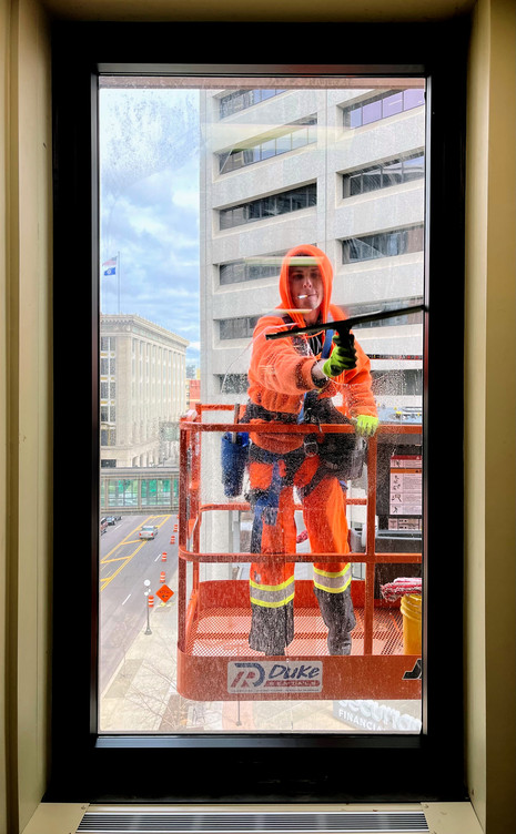 Photo of window washer at Robert Street