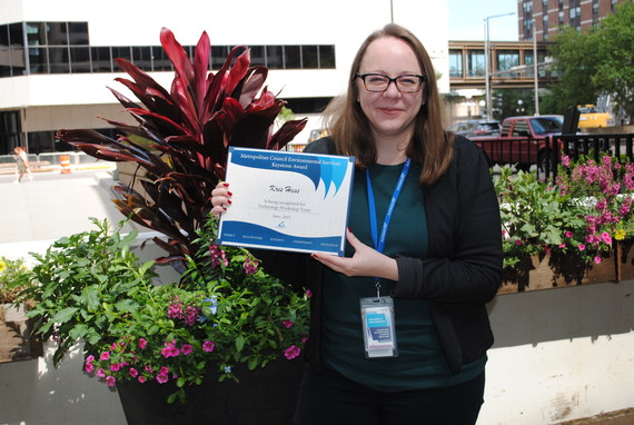 Former business systems analyst, 3, Kris Hess holds her Keystone award.