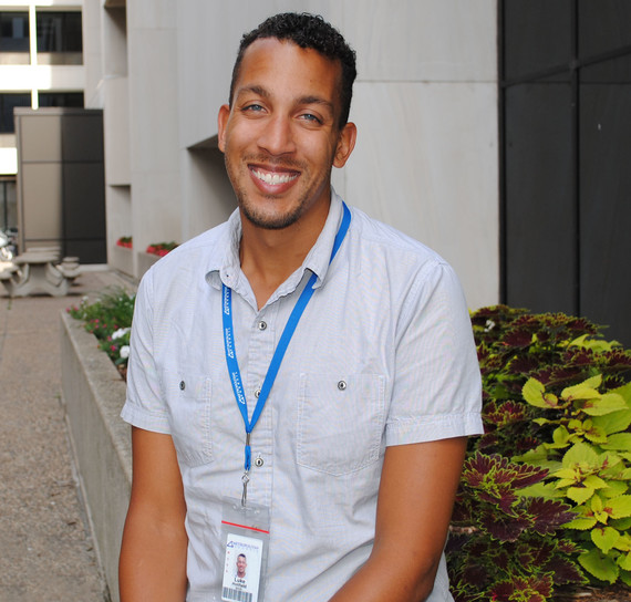 Luke Holifield, plant engineer sitting outside the Robert St offices.