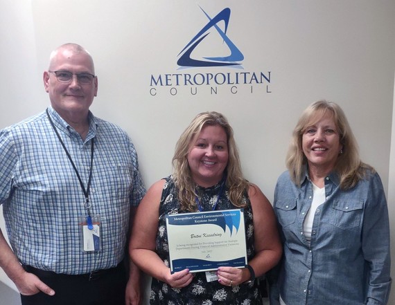 Craig Edlund and Karen Neis present Britni Kesselring with her Keystone award