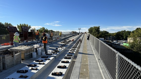 Construction workers on bridge