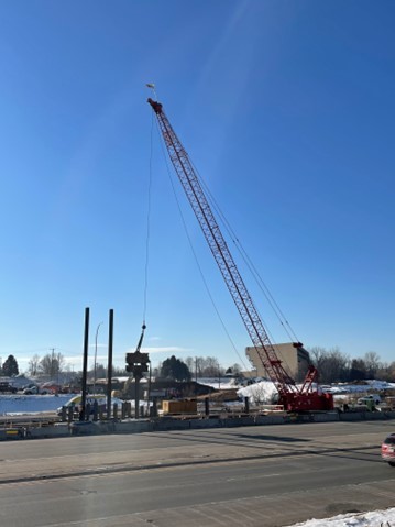 Photo Pile driving on the I-94 median for the new Bielenberg bridge in Woodbury.