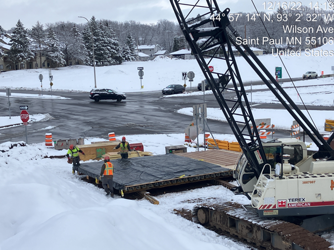 Crews continue bridge abutment work at the Etna Street Station area