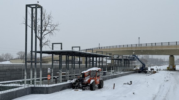 Bassett Creek Valley LRT Station under construction with street in background