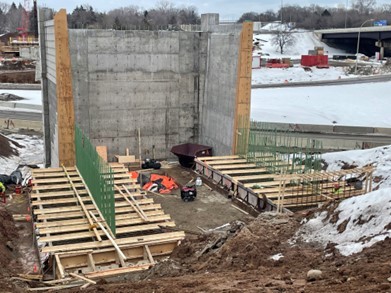 Photo: Bridge abutment wall near Etna Street. 