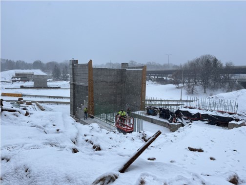 Photo: Bridge construction and rebar work continues near Etna Street.